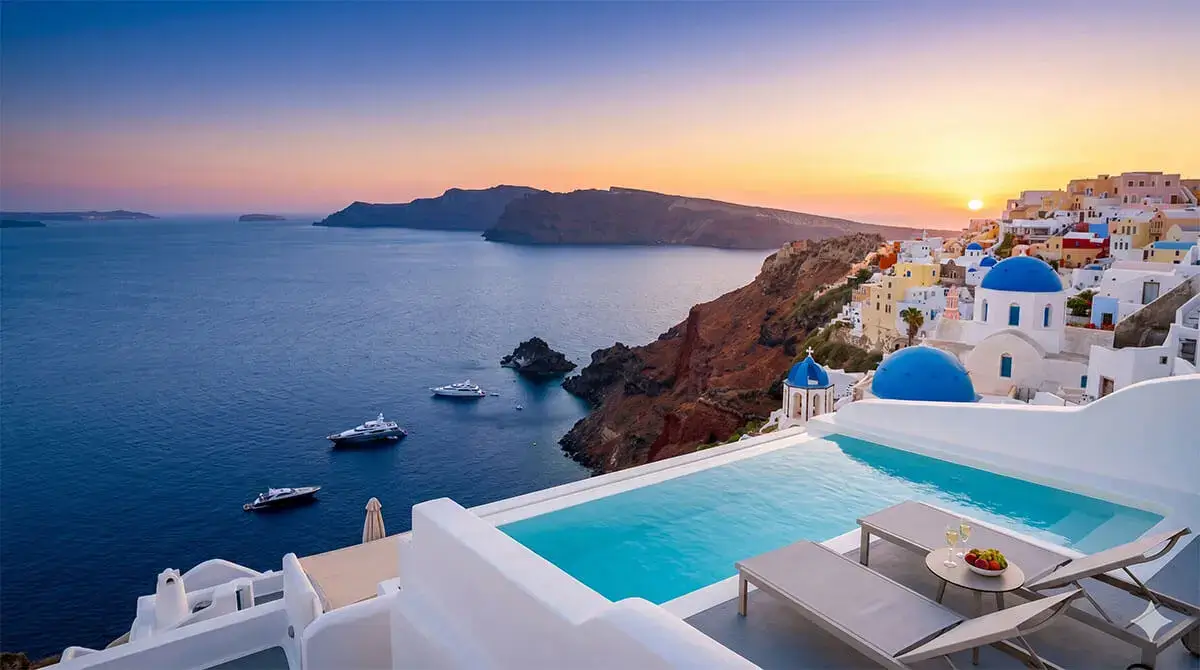 Luxury suite with private infinity pool overlooking the Caldera in Santorini, Greece.